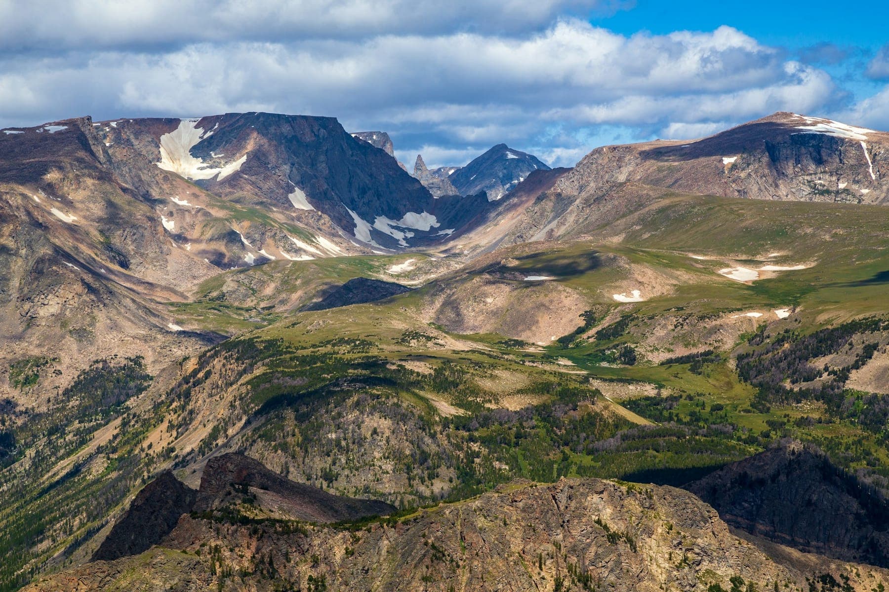 Snow-streaked peaks of the Beartooth Range from the top of Beartooth Pass