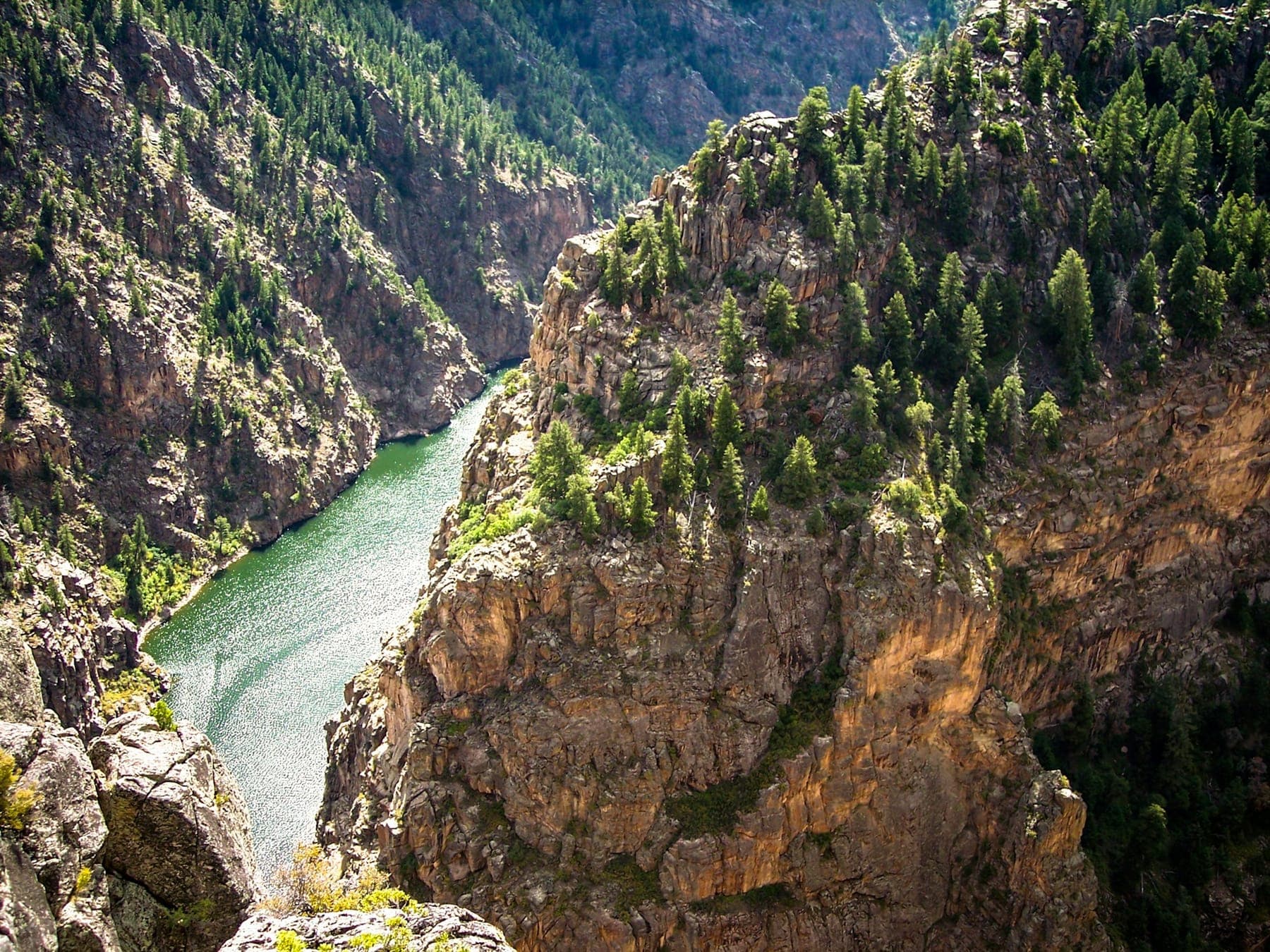 The Gunnison River bending through the sheer walls of the Black Canyon