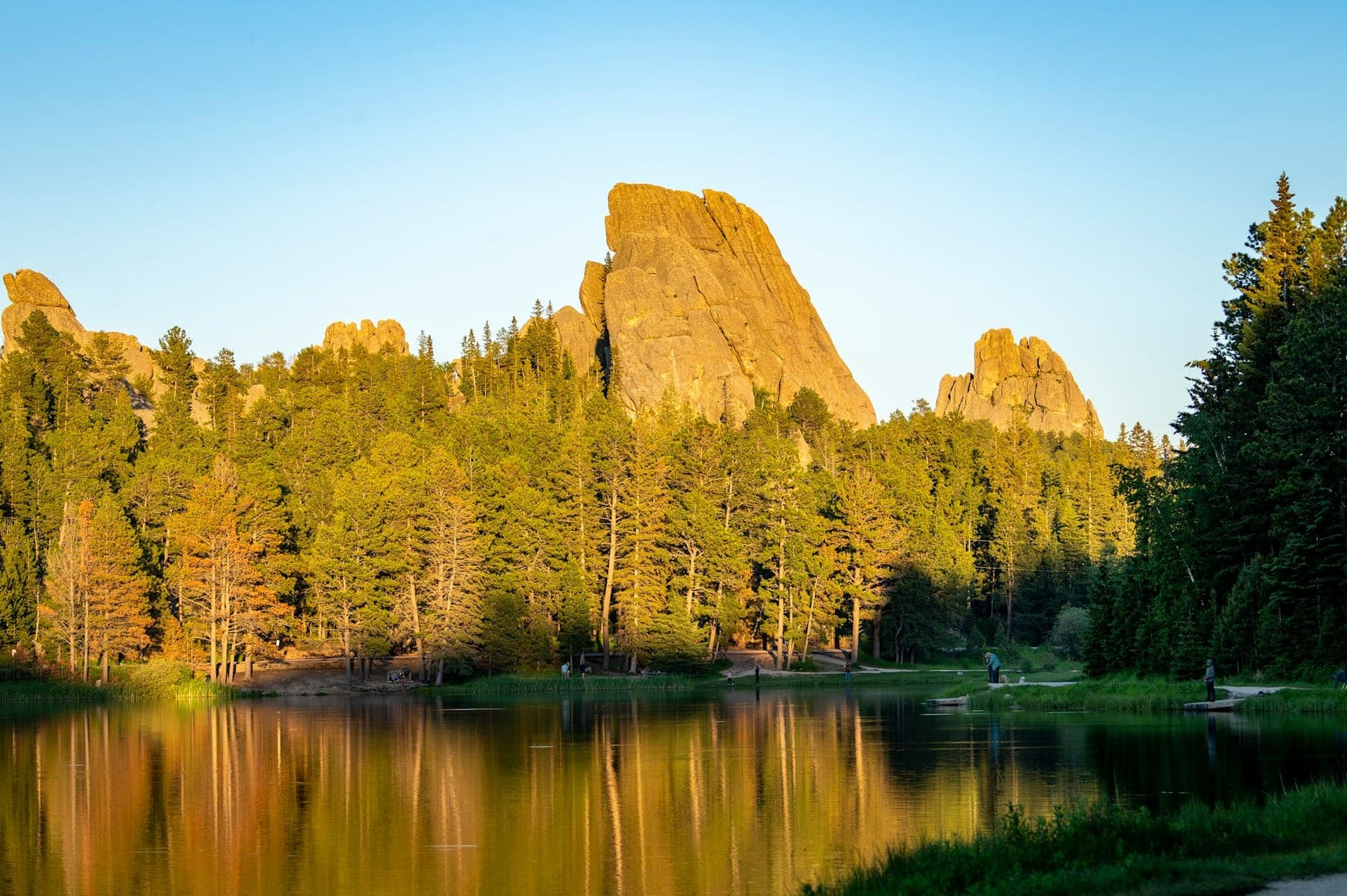 Golden evening light on the granite outcrops above Sylvan Lake